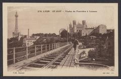 Black and white postcard view of Tramway Fourvière at Loyasse with metallic tower and Basilica of Fourvière
