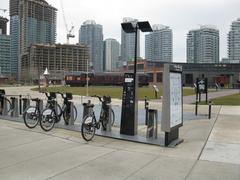 Rental bikes parked near John Street Roundhouse in Toronto