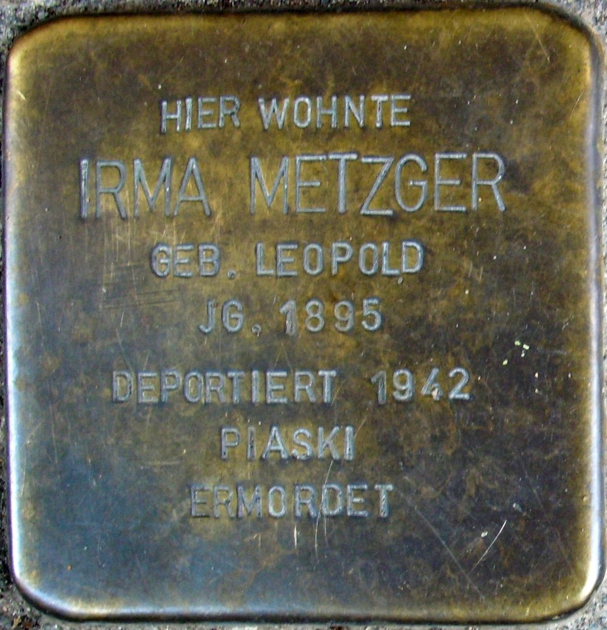 Stolperstein dedicated to Irma Metzger embedded in a sidewalk in Mainz, Germany