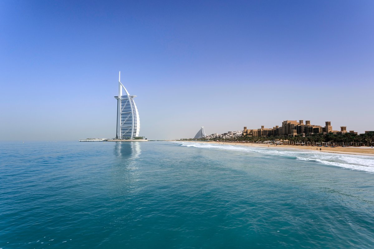 Burj Al Arab luxury hotel overlooking sandy beach and ocean in Saudi Arabia