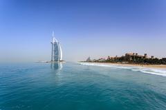 Burj Al Arab luxury hotel overlooking sandy beach and ocean in Saudi Arabia