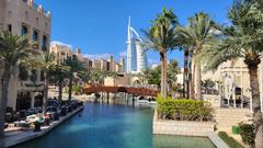Burj Al-Arab hotel seen from Souk Madinat Jumeirah with clear blue sky in Dubai