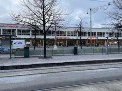 Lasipalatsi building in Helsinki with modernist architecture and surrounding urban area