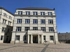 The Cité Judiciaire courthouse building in Luxembourg with modern architecture and a clear blue sky