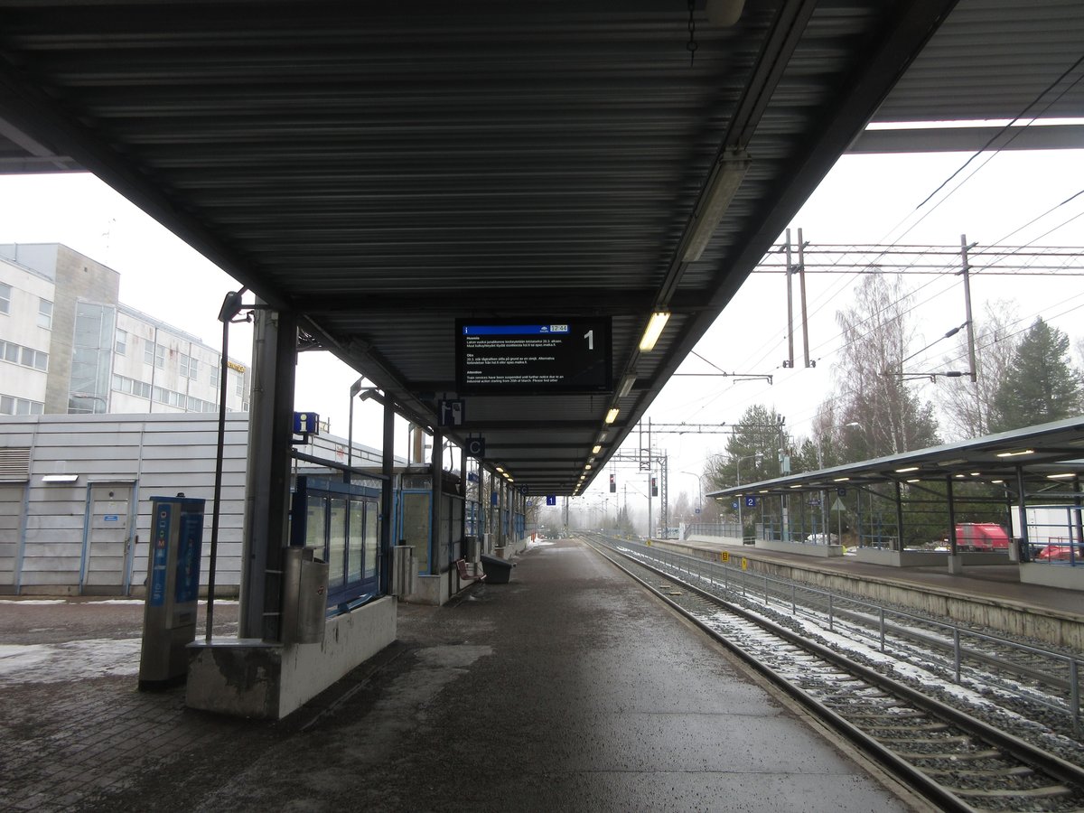 Digital information display showing train service suspension during locomotive strike at Kannelmäki train station in Helsinki
