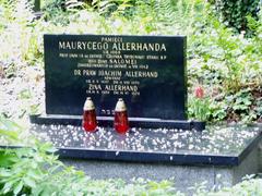 Grave of the Allerhand Family with engraved crosses and flowers