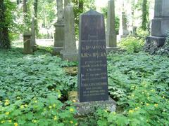 Grave of Aron Kirschner with tombstone and flowers