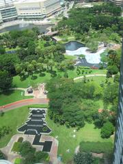 KLCC Park in Kuala Lumpur Malaysia with skyscrapers viewed from Traders Hotel