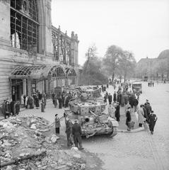 Cromwell and Challenger tanks of 8th Hussars 7th Armoured Division surrounded by German civilians outside Dammtor railway station Hamburg May 1945