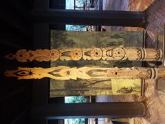 Sakang wooden pillars for village spirits at Siam Society Headquarters in Bangkok Thailand