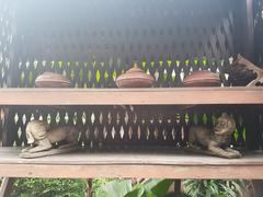 Water pots and animal images displayed at Siam Society Headquarters in Bangkok, Thailand