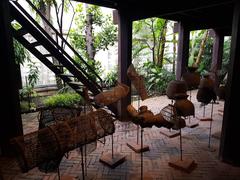 Traditional fish catching tools such as khong, lop, and sum displayed at Siam Society Headquarters in Bangkok, Thailand