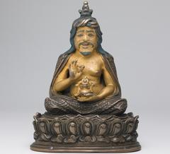 Portrait of Tangtong Gyelpo, Tibetan spiritual figure from the 15th century, depicted in copper alloy with pigment