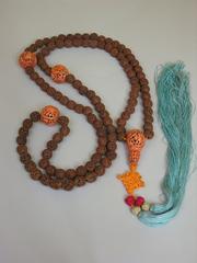 18th century peach pit and pink coral prayer beads from Qing dynasty China