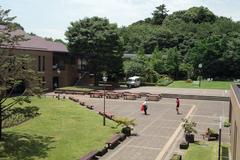 Keisen University Campus Plaza in Tokyo, Japan with modern buildings and greenery