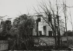 Black and white photo of the side facade of the former University Library building at Rapenburg 74 in Leiden, taken in 1974