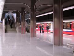 Warsaw Metro Ratusz station platform with passengers and trains