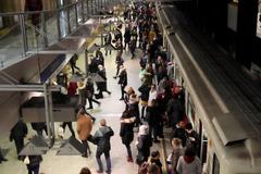Warsaw Metro Centrum Station interior with modern design and passengers