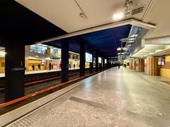 Warsaw Metro Centrum station platform with modern design and yellow support columns