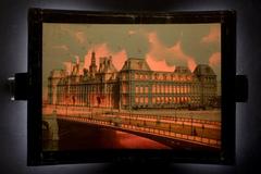 Hotel De Ville building in Paris on fire during daytime circa 1875