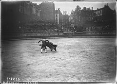 Historic image of a bullfight at the Arènes de Lutèce in Paris with toreros and fighting bulls
