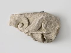 Carved limestone architectural fragment with vegetal and geometric frieze motifs from 2nd-3rd century amphitheater wall