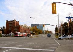 Carling Avenue at Merival Road intersection with traffic and buildings in Ottawa Ontario Canada