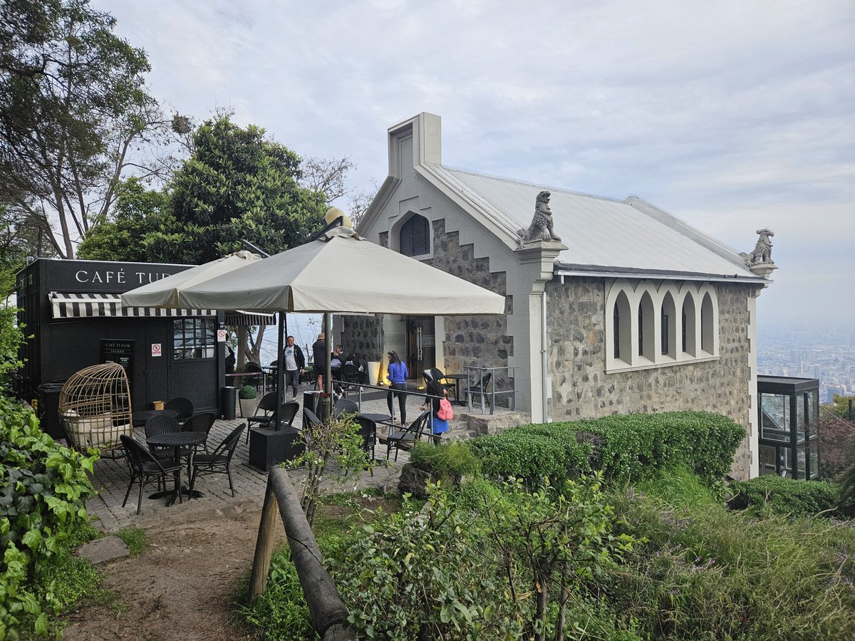 Café Tudor and Casa Tudor buildings in Parque Metropolitano of Santiago surrounded by greenery