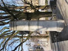 Monument to Anton Aškerc at the southwestern corner of the Križanke complex