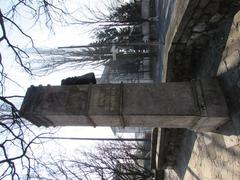 Monument to Anton Aškerc at southwestern corner of Križanke complex