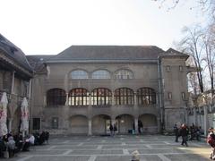 Main courtyard of the Križanke complex with historic architecture and trees
