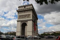 Arc de Triomphe monument in Paris France under blue sky