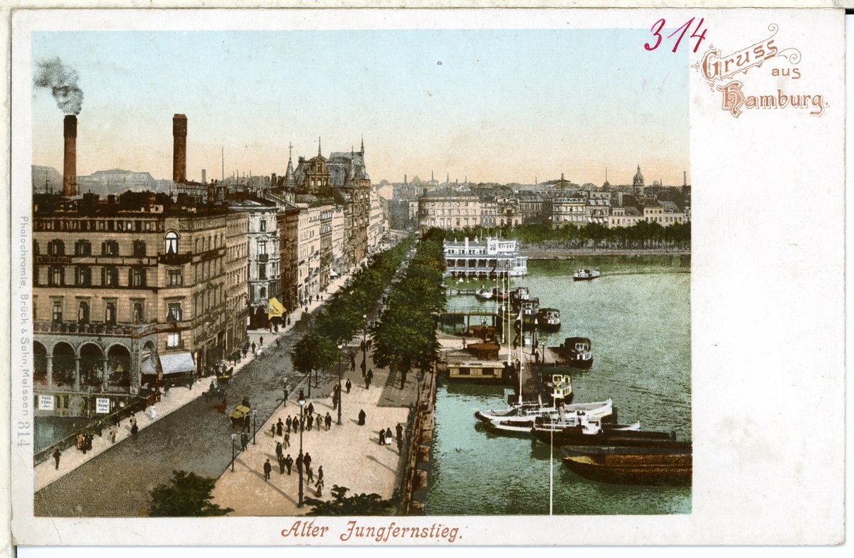 Historic black and white photo of Alter Jungfernstieg in Hamburg circa 1898 showing period buildings and street life