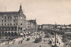 Historic Jungfernstieg street in Hamburg in 1900 with vintage cars and pedestrians