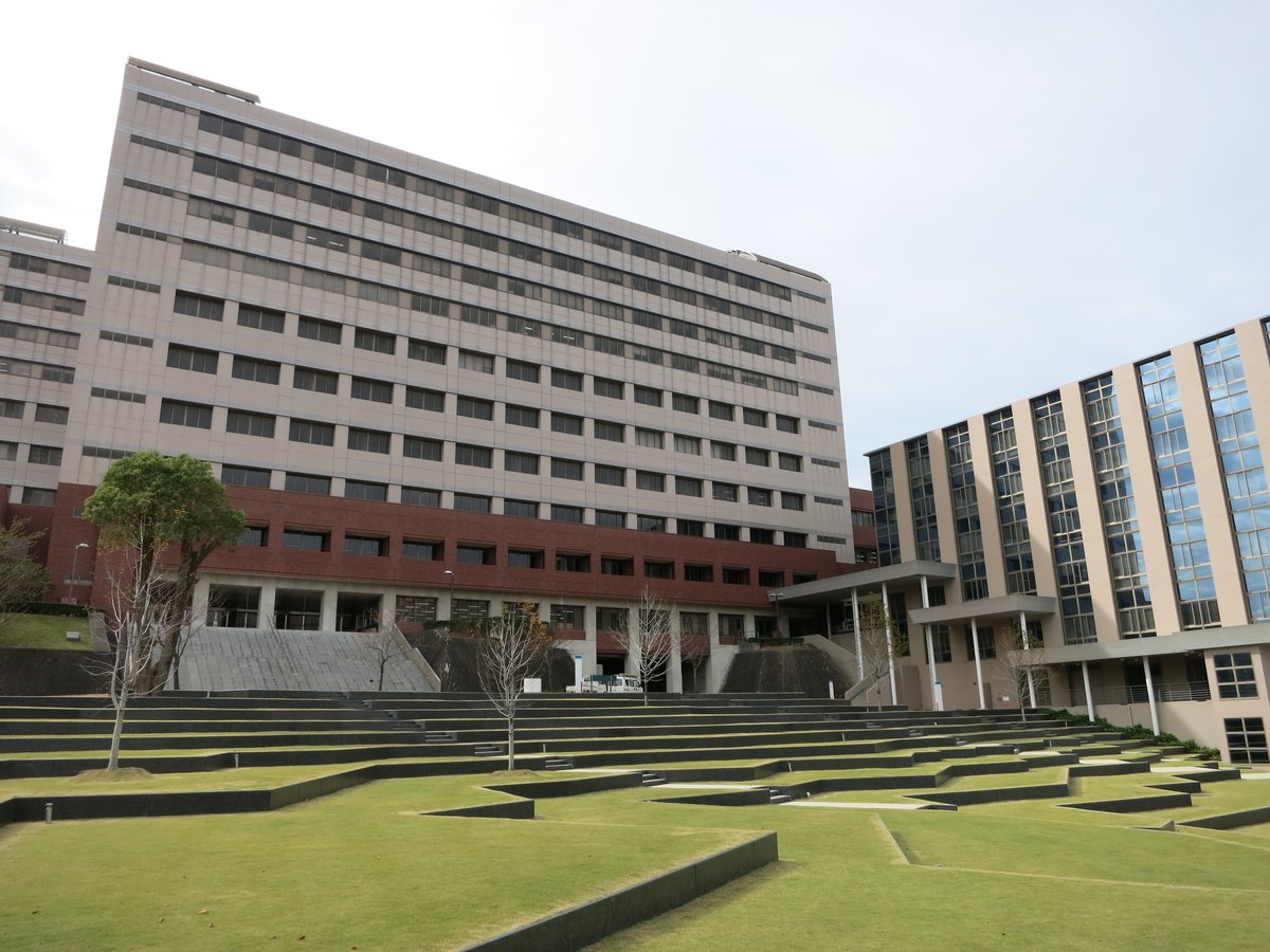 Kyushu Sangyo University campus building with blue sky