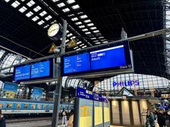 Departure boards showing train schedules at Hamburg Hauptbahnhof station