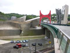 Puente de la Salve bridge and Guggenheim Museum in Bilbao with a blue sky