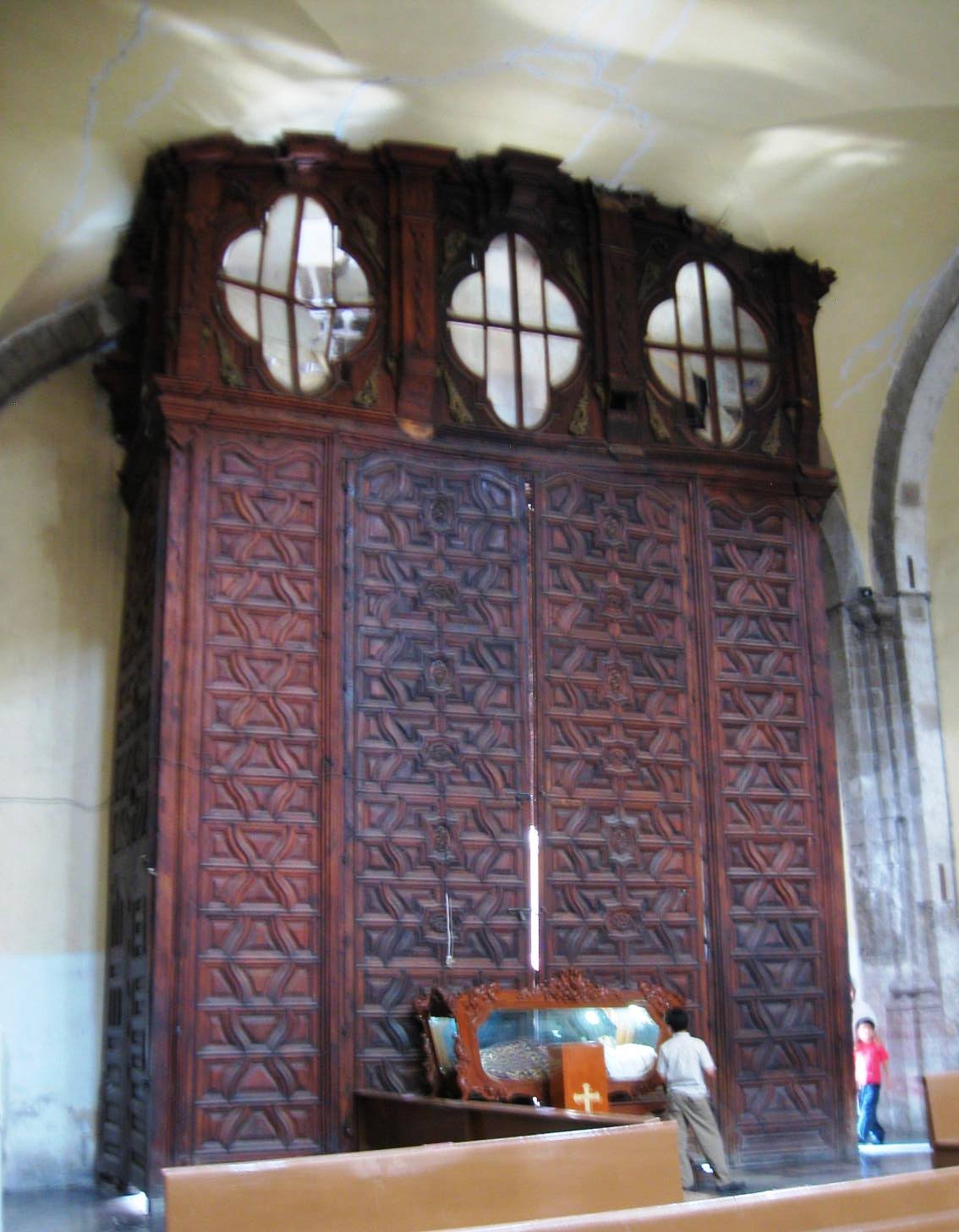 Cedar panel covering the main entrance of La Santisima Church in Mexico City