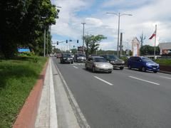 Busy Roxas Boulevard with heavy pedestrian and vehicle traffic in Malate, Manila