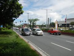 Busy intersection at Roxas Boulevard with Mabini, Ocampo, and Adriatico Streets in Malate, Manila
