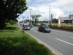 Busy intersection at Roxas Boulevard in Malate, Manila with multiple roads including Harrison Avenue, Mabini Street, Pablo Ocampo Street, and Adriatico Street