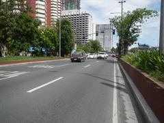 Roxas Boulevard in Malate, Manila with street intersections including Harrison Avenue, Mabini Street, Pablo Ocampo Street, and Adriatico Street