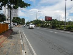 Vicente Lim Monument along Roxas Boulevard in Malate, Manila with surrounding city streets and buildings