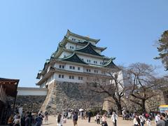 Nagoya Castle in central Japan with traditional Japanese architecture and lush greenery