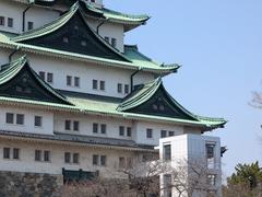 Nagoya Castle in central Japan with traditional Japanese architecture and stone walls