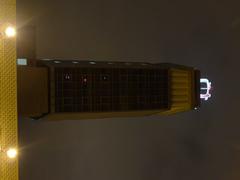 Tall building of Czech Television at night with illuminated windows