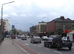 Leonard's Corner and Upper Clanbrassil Street in Dublin, Ireland, busy urban street scene with pedestrians and vehicles