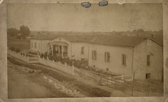 Historic image of Las Vegas College building in New Mexico around 1880