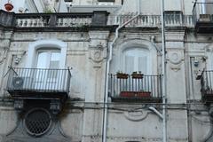 Courtyard windows of Palazzo Serra di Cassano in Naples