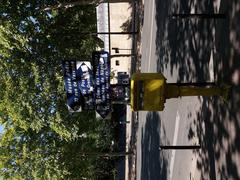 Street signs and mailbox on Boulevard des Invalides in Paris 7th arrondissement